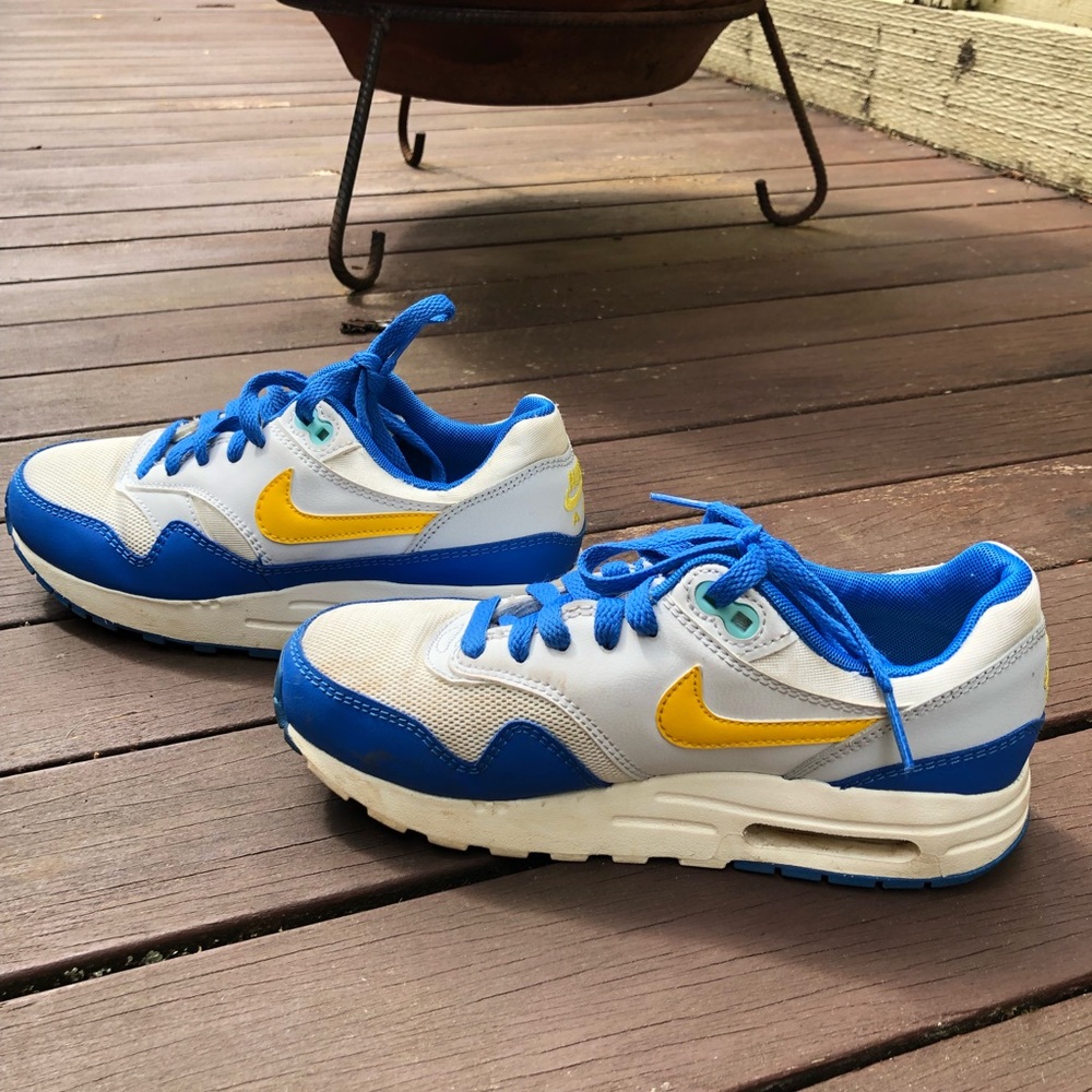Blue and white Nike Air Max 1 shoes